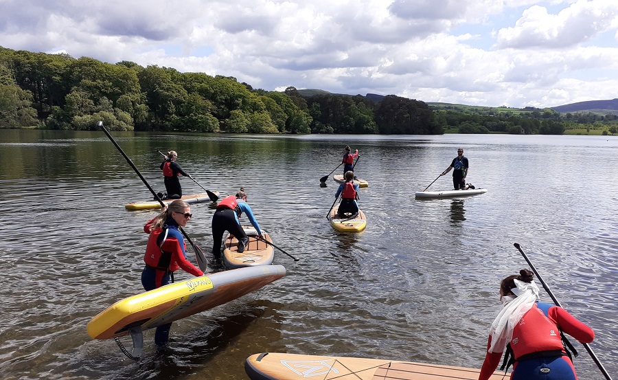 Stand Up Paddle Boarding for a Hen Party at Talkin Tarn in Cumbria